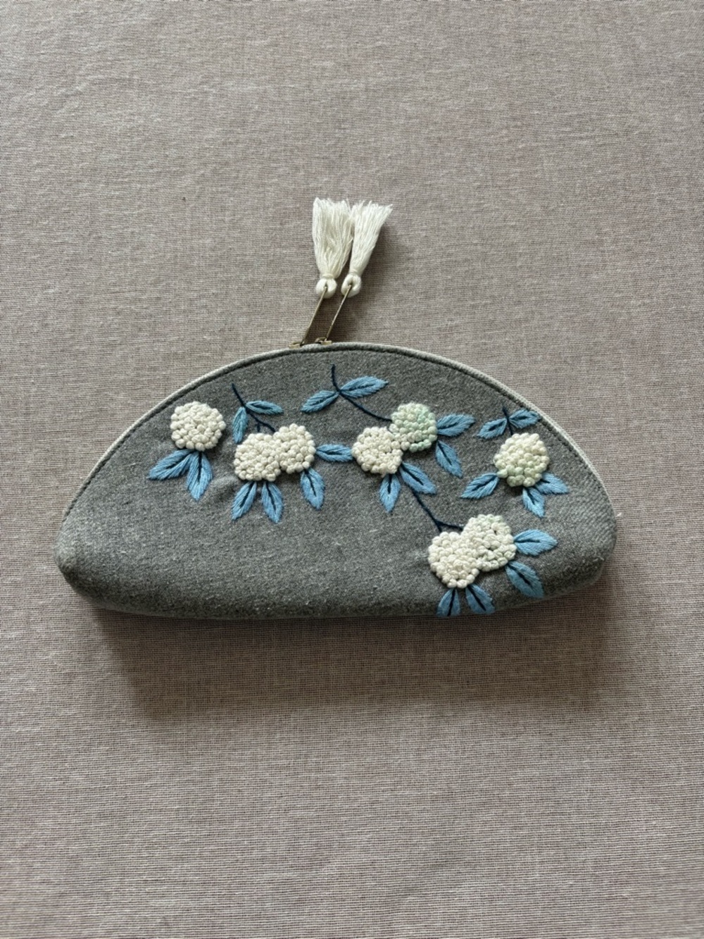 Grey embroidered floral half moon whimsical coquette clutch bag.